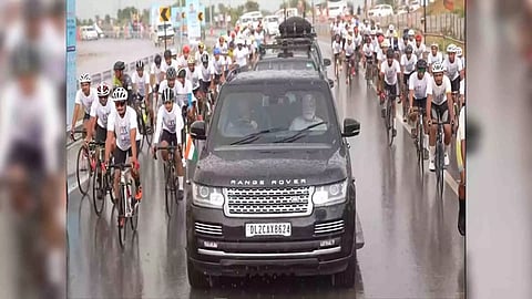 Prime Minister Narendra Modi's road show accompanied by cyclists (Photo: ANI)