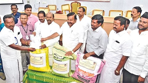 Ministers EV Velu and KN Nehru distributing kuruvai special package kits to beneficiaries in Tiruchy on Saturday