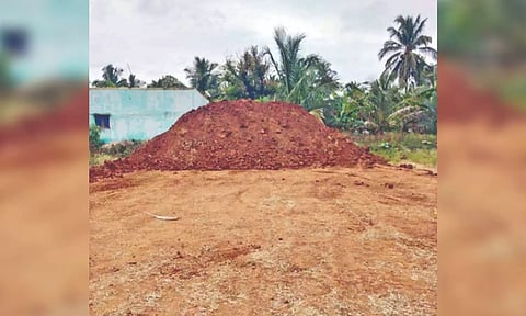 Area from where sand was illegally mined and accumulated for transportation, near Tirupattur