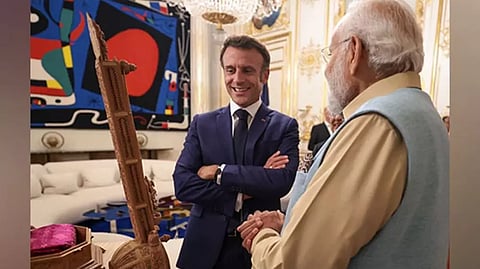 Prime Minister Narendra Modi gifts a Sandalwood Sitar to French President Emmanuel Macron