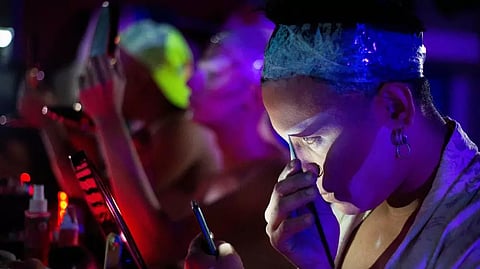 Drag Queen Peppe Pig from Guatemala puts on makeup before performing at the Mix Imperial Central American Tropical Drag Royale 2023 pageant in Managua, Nicaragua