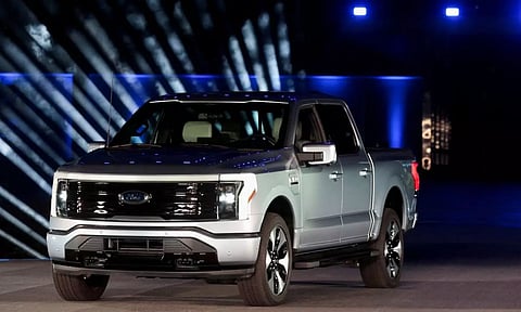 The all-electric Ford F-150 Lightning pickup truck is unveiled at the company's world headquarters