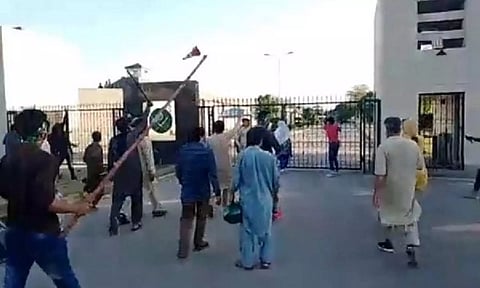A violent mob entering the General Headquarters (GHQ) in Rawalpindi