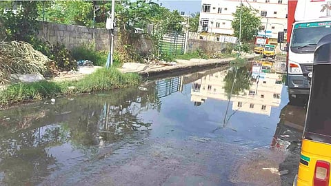 Stagnated sewage water on the main road in the neighbourhood