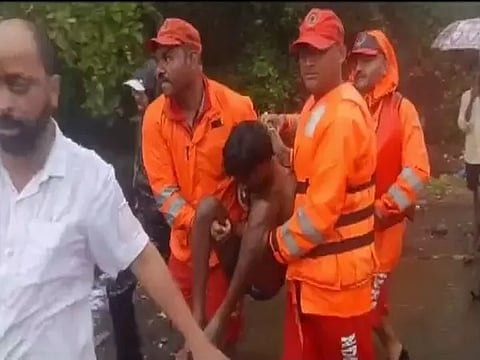 NDRF rescues person stuck under bridge in Ratnagiri (Picture credit:ANI)