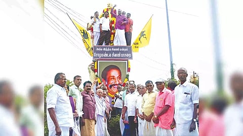 Sivaji fans from Thanjavur garlanding the statue of the late actor on his death anniversary in Tiruchy