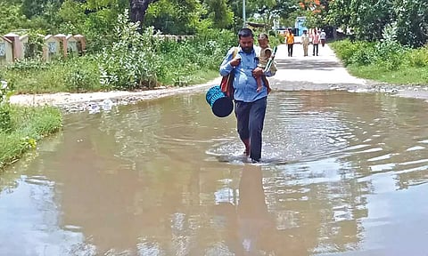 Public are forced to wade through the stagnant water