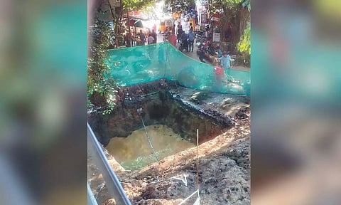 A pit dug up for the development work