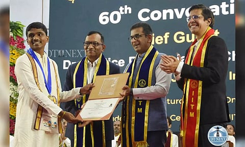 Chief Justice of India DY Chandrachud presenting the degree certificate to the students (Credits: Justin George)