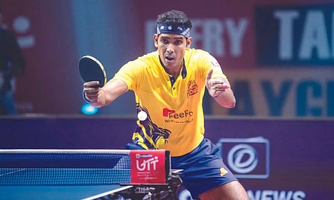 Sharath Kamal in action against Harmeet Desai