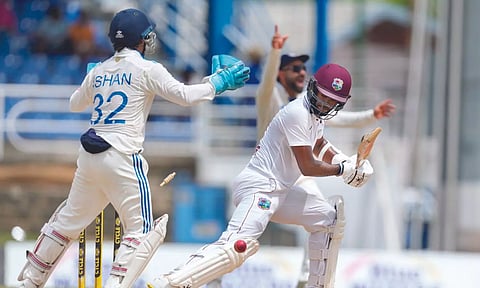 West Indies’ captain Kraigg Brathwaite is bowled by R Ashwin