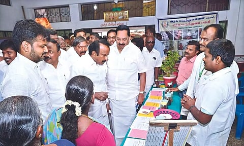 Ministers S Muthusamy and R Gandhi inaugurating a medical camp for weavers in Erode on Monday