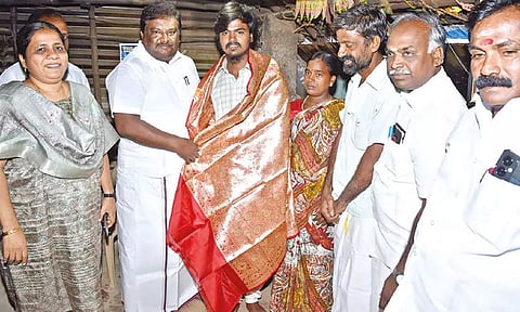 Minister SS Sivasankar felicitating Tanuvas admission topper Rahul Kanth in Ariyalur