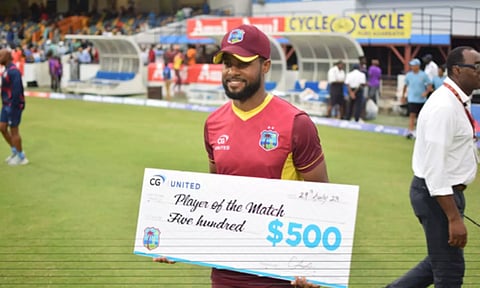 Shai Hope with the man of the match award.