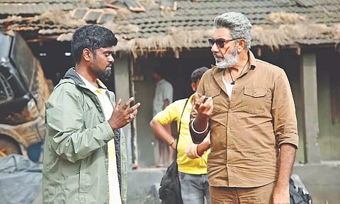 Guhan Senniappan and Sathyaraj on the sets of Weapon