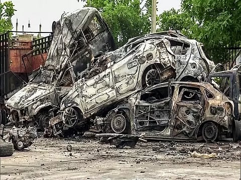 Vehicles torched by rioters during clash in Haryana's Nuh. (ANI)