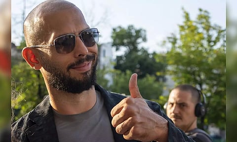 Tate released from house arrest while he awaits human trafficking & rape trial