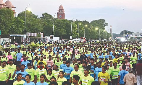 People participate in the fourth Karunanidhi memorial international marathon conducted by DMK as part of centenary celebration of former CM Karunanidhi on Sunday.