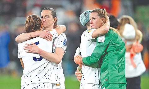 USA players show dejection after the team’s exit from the World Cup.