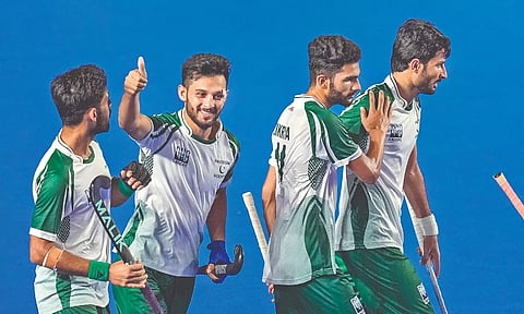 Pakistan’s Afraz celebrates after scoring a goal against China.