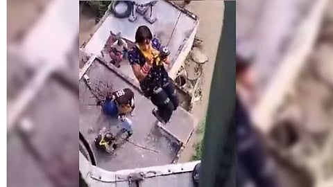 A woman being rescued by IAF helicopter (Photo/IAF)