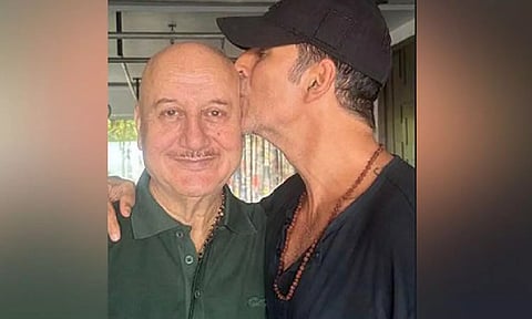 Akshay Kumar is seen kissing on Anupam Kher on Forehead (ANI)