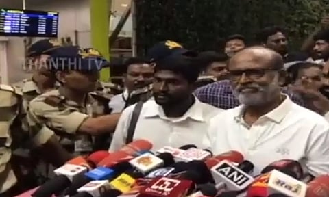 Actor Rajnikanth speaking to reporters at the Chennai airport (Daily Thanthi)