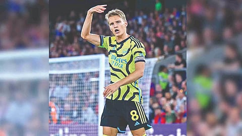 Odegaard celebrates scoring his second-half penalty