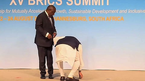 PM Modi immediately picked up the tricolour placed on stage at a BRICS meeting