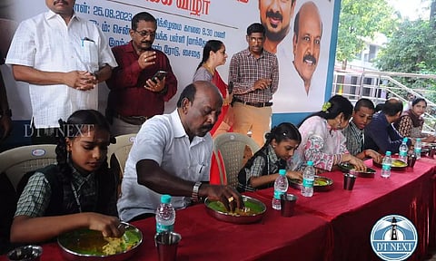Ma Subramanian having breakfast along with students at Chennai Girls Higher Secondary School in Mathoppu. Manivasagan N