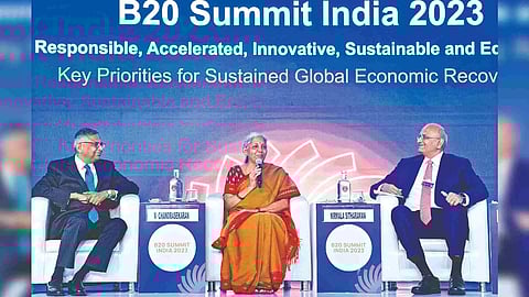 FM, flanked by R Chandrasekaran, R Dinesh (CII chief) at B20 Summit