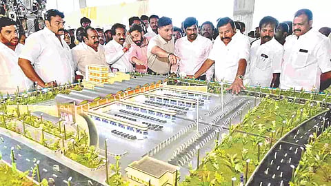 Minister KN Nehru inspects the ongoing works for the bus terminal in Tiruchy on Friday