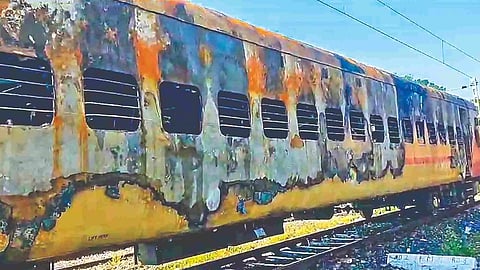 Remains of the train’s coach that caught fire at the Madurai railway station on Saturday