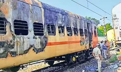 Security personnel at the spot after a fire broke out in a coach of a train at Madurai railway station, Saturday.(PTI)&nbsp;