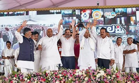 As K’taka Cong delivers promised freebies, BJP raises bankruptcy fears