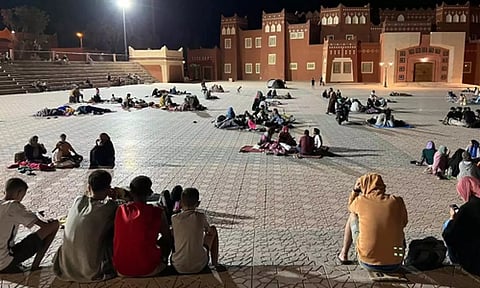 People gather on a street