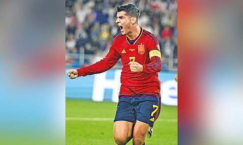 Alvaro Morata celebrates after his hat-trick