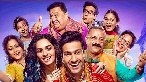 Still from The Great Indian Family poster