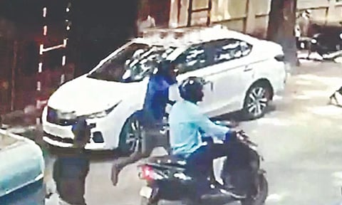 Video grab of the armed gang chasing the duo in a busy
area of Coimbatore