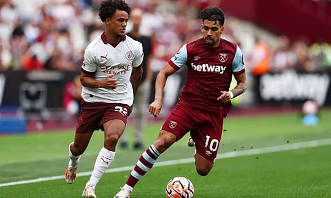 Manchester City's Oscar Bobb in action with West Ham United's Lucas Paqueta (Photo: Reuters)&nbsp;