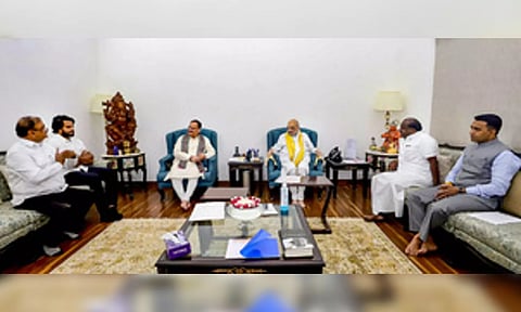H D Kumaraswamy with Home Minister Amit Shah, and party president J P Nadda