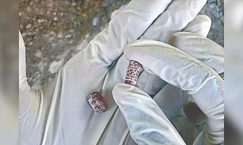 TNSDA unearthed two Carnelian beads inside an urn at Kondagai in Keeladi.