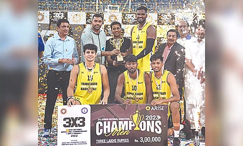 Tamil Nadu men's team pose with the trophy