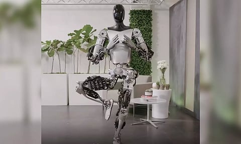 Musk showcases Tesla humanoid robot performing Yoga, Namaste