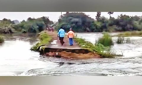 The washed away footpath across the Palar near Gudiyattam on Tuesday