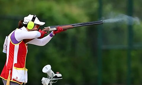 China's Li Qingnian in action during the Women's Trap-50 Qualifications. (Reuters)