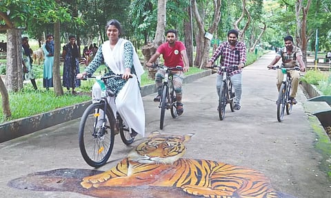 Visitors pedal around in Kurumbapatti Zoo in Salem