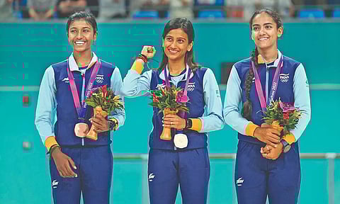 Bronze medallists Karthika Jagadeeswaran, left and Heeral Sadhu