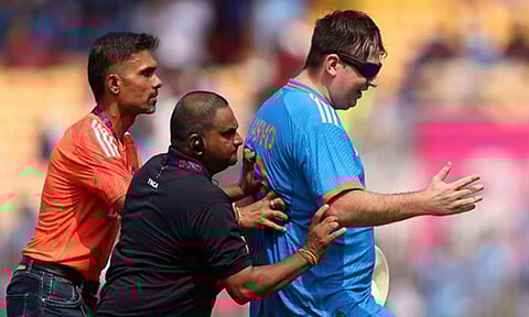 Jarvo being escorted from the stadium (Image: ANI)