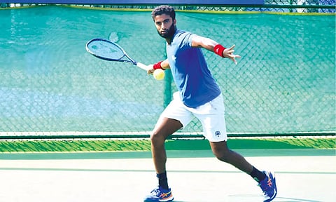 Manish Sureshkumar returns a serve during his outing at National C’ship